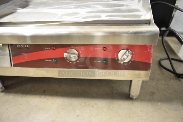 Avantco 177EG24N stainless steel electric griddle, countertop model. Features dual control knobs, power, and heating indicators.
