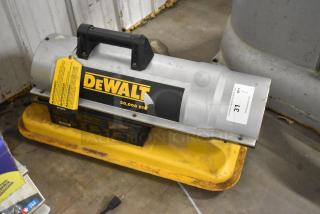 DeWalt DXH50K 50,000 BTU forced air kerosene heater with handle. Yellow warning tag attached, minor wear visible.