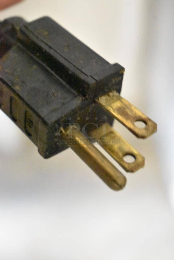 Plug of Nemco 6150-36-CP Commercial Heat Strip Warmer showing three-prong design, suitable for 120V, 1 Phase outlet.