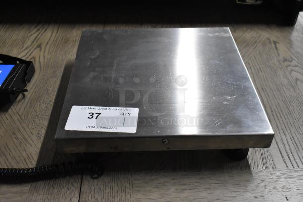AvaWeigh 334RS400 400 lb. digital receiving scale, stainless steel platform, remote display, good condition, auction label visible.