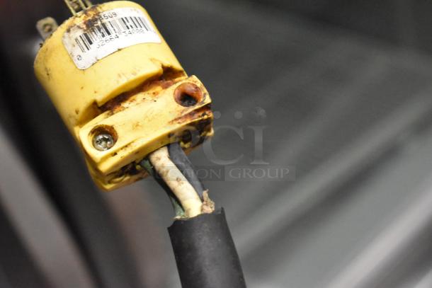 Gold Medal 8050 FW-12 fryer plug showing wear and rust, 208/240V, 1 phase, for commercial countertop use.