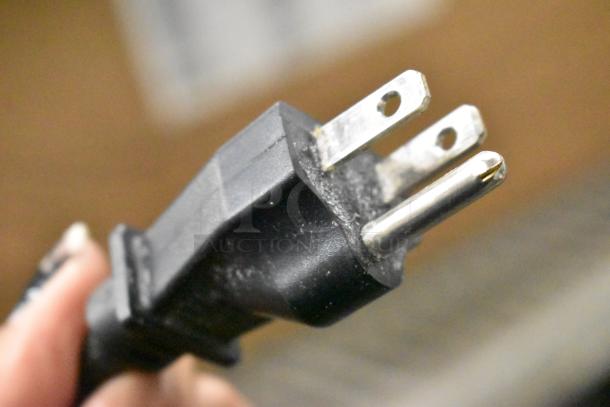 Hamilton Beach HMD400 commercial milkshake mixer's power plug, showing its 3-prong, 120V compatibility.