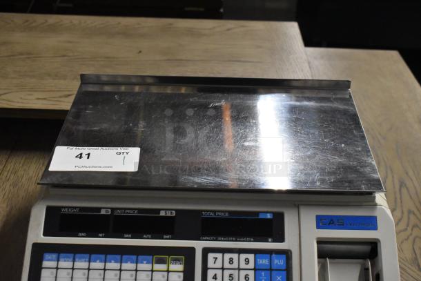 CAS LP-1000 metal countertop scale, 120 volts, single-phase, features label printer. Visible tag indicates auction lot number 41.