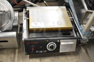 Centaur Metal Commercial Countertop Panini Press with temperature dial, power switch, and caution label, minor wear visible.