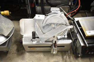 Globe Stainless Steel Commercial Countertop Meat Slicer w/ Sharpening Blade. 115 Volts, 1 Phase. - Item #1220845