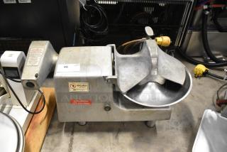 Hobart 84143 metal commercial countertop buffalo chopper with power hub, used condition, 460 volts, 3 phase, safety labels visible.