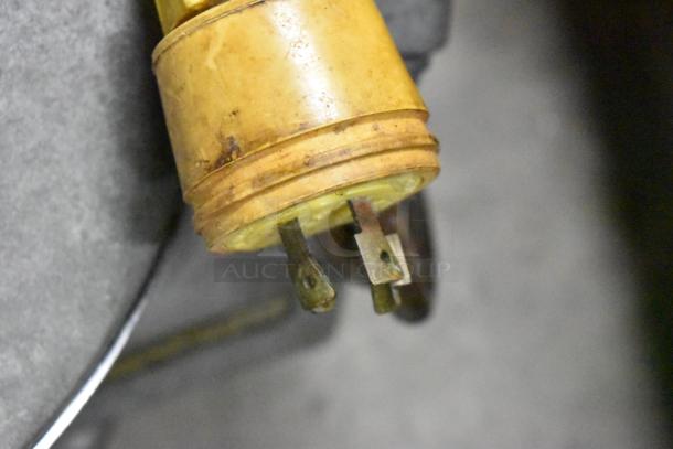 Hobart 84143 metal commercial countertop buffalo chopper plug close-up, 460V, 3 phase, shows wear.