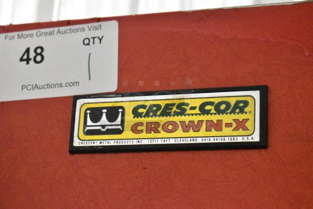 Cres-Cor Crown-X H-137-UA-12 heated holding cabinet, red exterior, visible brand and model label, commercial casters.