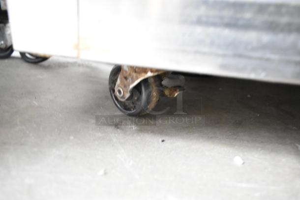 2020 Delfield 406P-STAR2 undercounter cooler on commercial casters, showing rust on wheel. Stainless steel, 115V, 1 phase.