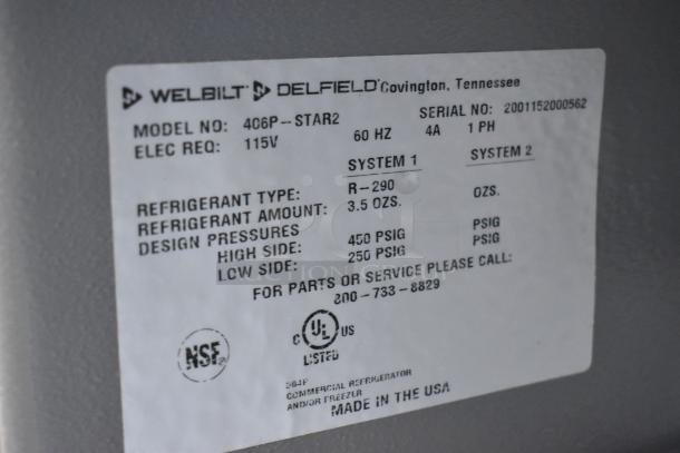 Label on 2020 Delfield 406P-STAR2 cooler. Shows model, electrical requirements, refrigerant type, and contact info.