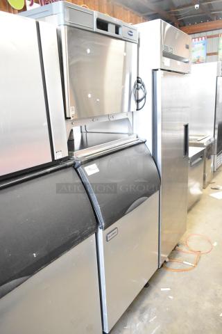 2024 Follett HMC1410WBT stainless steel commercial ice head on bin. 208-230V, 1 phase. Clean condition, labels visible.