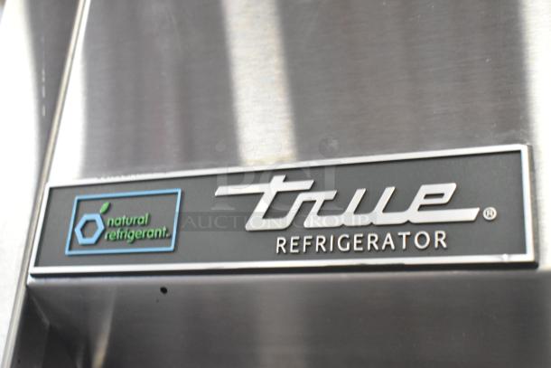 2019 True TG1R-1SLH-HC stainless steel cooler, features natural refrigerant label.