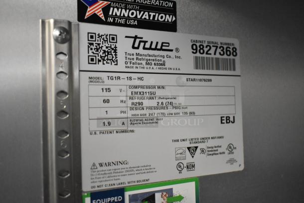 Label on 2019 True TG1R-1SLH-HC single door cooler, showing model, voltage, refrigerant details, and certifications.