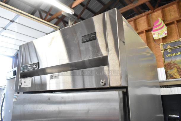 2019 True TG1R-1SLH-HC stainless steel single-door reach-in cooler, poly-coated racks, commercial casters, 115V, 1 phase.