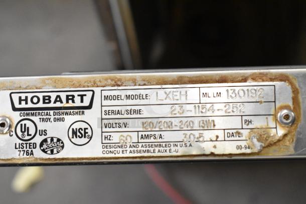 Hobart LXEH commercial undercounter dishwasher label showing model, serial number, and voltage. Includes NSF and UL listings.