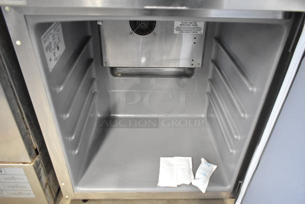 2023 Delfield 406P-STAR2 stainless steel undercounter cooler interior, showing clean condition and labeling details.