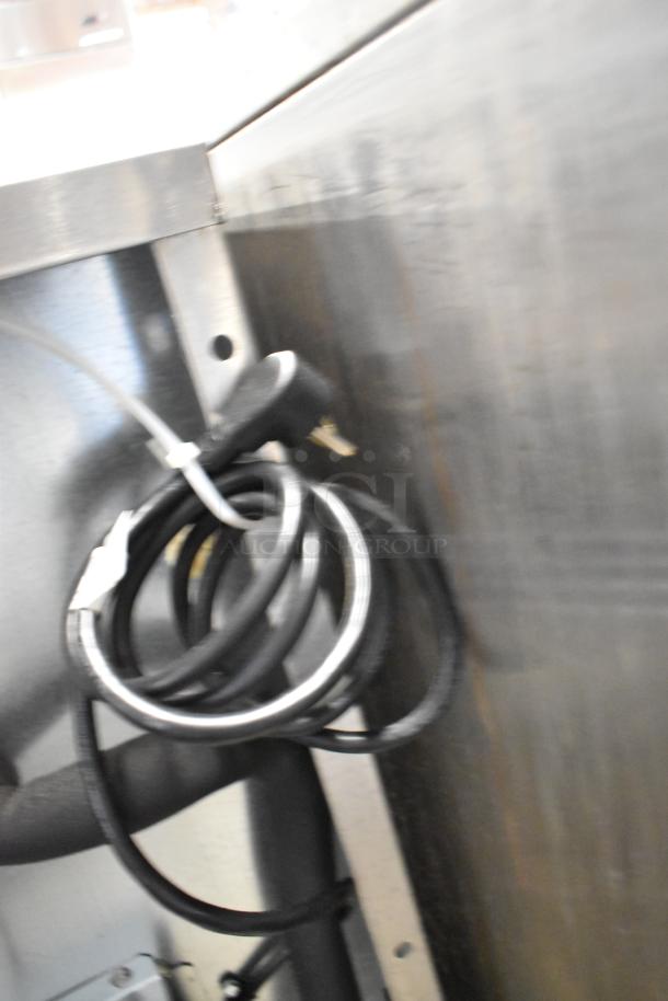 2023 Delfield 406P-STAR2 stainless steel undercounter cooler on casters, 115V, 1 phase, commercial use. Power cord shown.