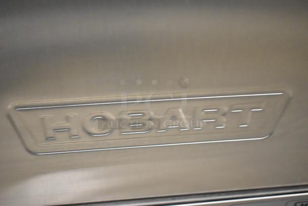 2023 Hobart LXER stainless steel commercial undercounter dishwasher, embossed logo, 120/208-240 volts, 1 phase.
