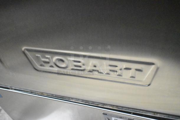 2019 Hobart LXER stainless steel undercounter dishwasher. Features "HOBART" logo. Model LXER, 120/208-240V, 1 Phase.