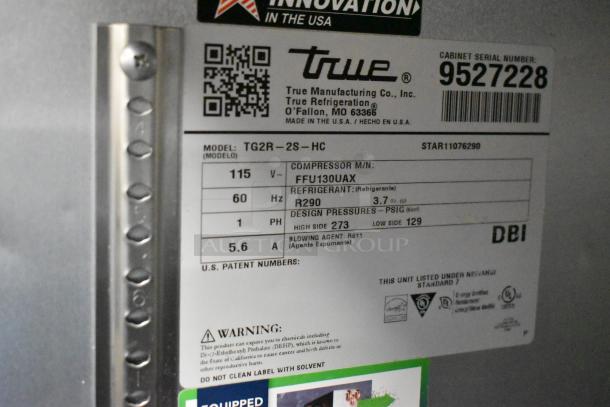 2018 True TG2R-2S-HC stainless steel cooler label showing model, compressor, refrigerant, and pressure info.