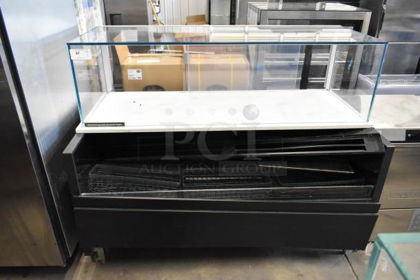 Structural Concepts SBZ6652DR metal grab-n-go merchandiser on casters, 220V, 1 phase, glass display, used condition.