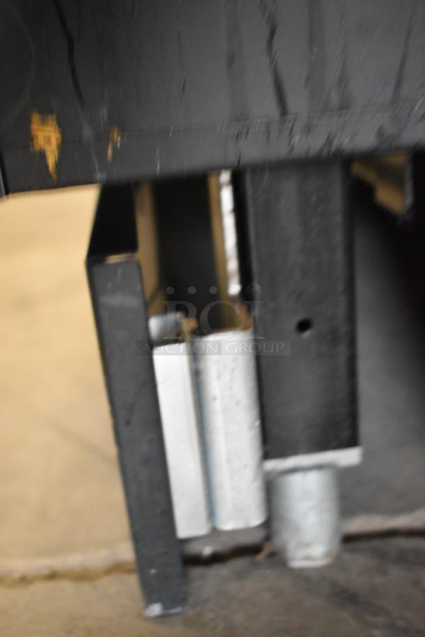 Structural Concepts SBZ6652DR metal commercial grab-n-go merchandiser base, visible on commercial casters, minor wear.