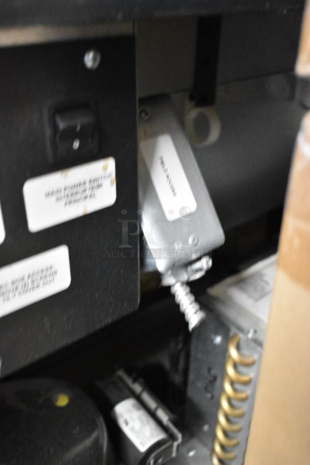 Structural Concepts SBZ6652DR commercial merchandiser interior, showcasing switch and wiring. Designed for 220 Volts, 1 Phase.