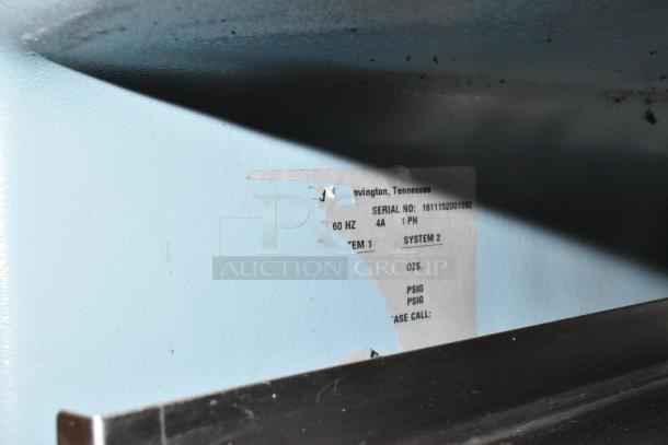 2016 Delfield stainless steel single-door undercounter cooler, serial no. 1611152001592, on commercial casters, 115V, 1 phase.