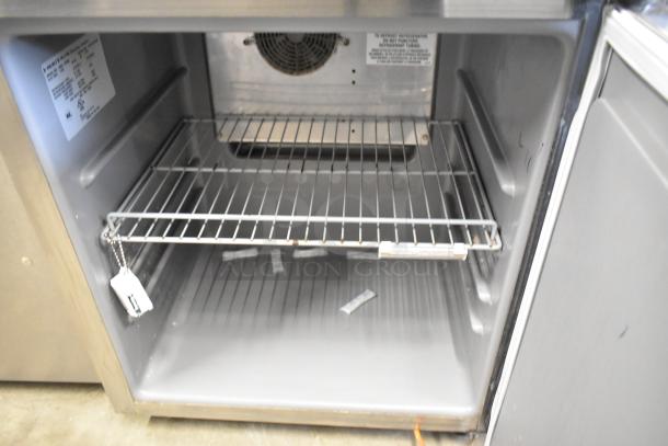 2020 Delfield 406P-STAR2 stainless steel single door undercounter cooler, on casters, 115V, 1 phase. Interior view.