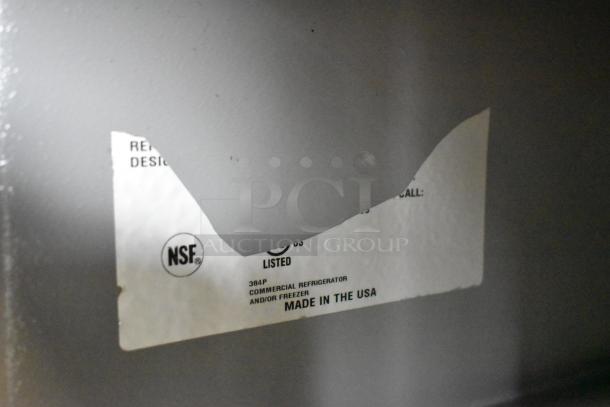 Delfield 406P-STAR2 stainless steel undercounter cooler label shows NSF certification and "Made in the USA" marking.