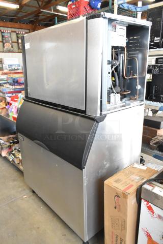 2023 Ice-O-Matic CIM1446HR6 stainless steel commercial ice head on bin. 208-230V, 1 phase. Excellent condition, durable build.