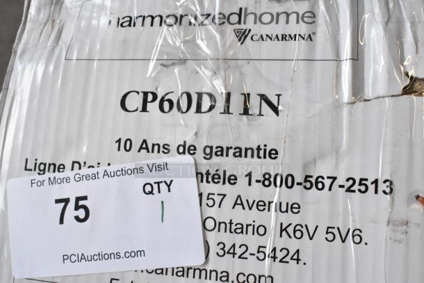 Brand new Canarm 60" industrial ceiling fan, scratch and dent condition. Model CP60D11N, 8944 CFM, 120V, 1 phase. Box shows wear.