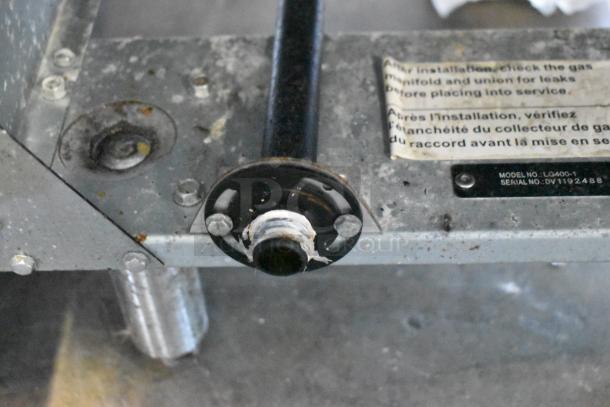 Vulcan LG400-1 stainless steel commercial gas fryer. Features model label, 120,000 BTU, sturdy construction.