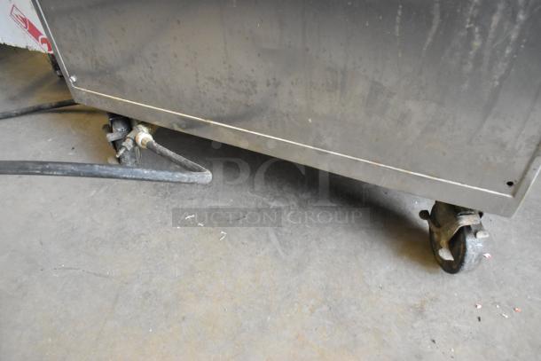 Electro Freeze 88TF batch freezer, stainless steel, on commercial casters. Shown with wear, 230V, 1 phase.