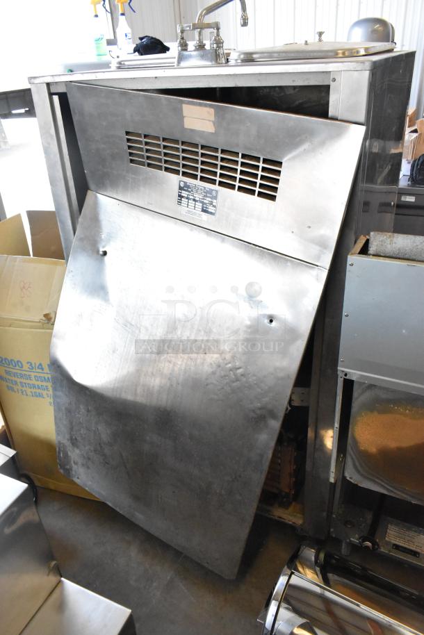 Electro Freeze 88TF stainless steel batch freezer on casters, 230V, 1 phase. Visible wear on exterior panel; model label intact.