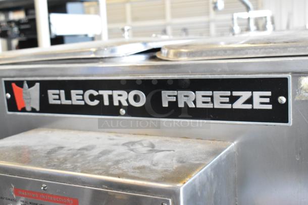 Electro Freeze 88TF stainless steel batch freezer, commercial floor style, on casters, 230V, 1 Phase, branded label visible.