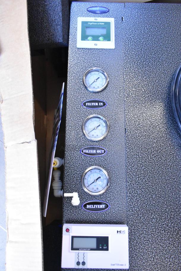 Brand new reverse osmosis system, scratch and dent, includes RO-2000 tank, gauges for filter in/out, delivery, and digital display.