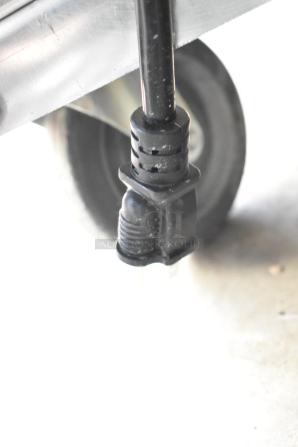 Avantco 177HPI1836 commercial heated holding cabinet on casters, showing a power cord. 120V, 1 Phase, in good condition.