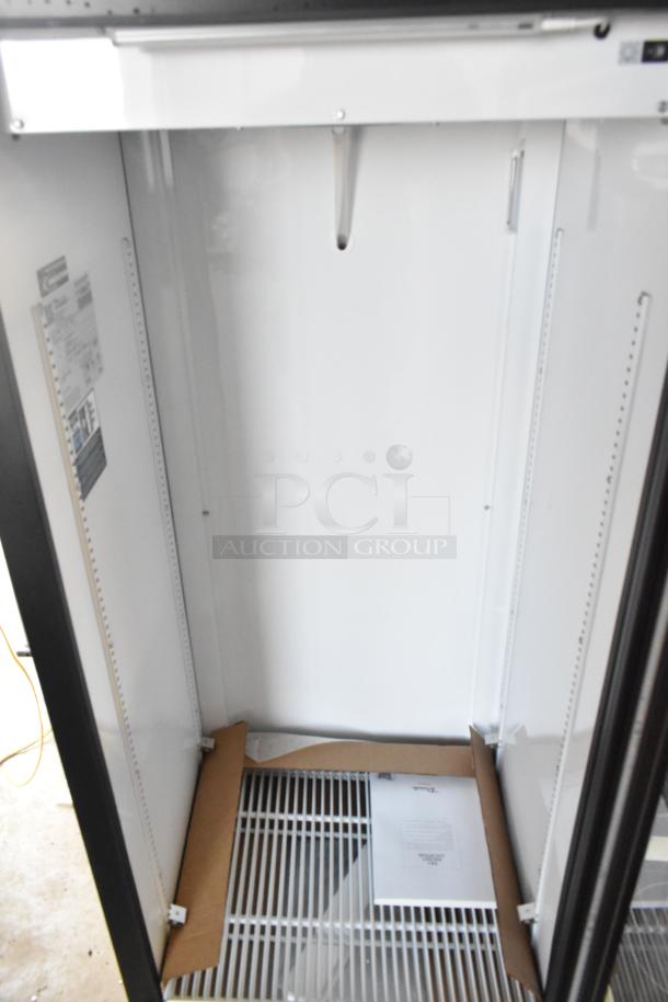 True GDM-12-HC single door cooler merchandiser, scratch and dent, new condition, poly-coated racks, 115V, 1 Phase.