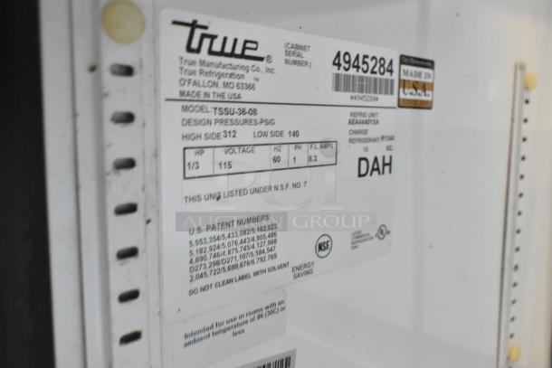 True TSSU-36-08 stainless steel sandwich prep table with model details, serial number 4945284, 115V, and NSF certification.