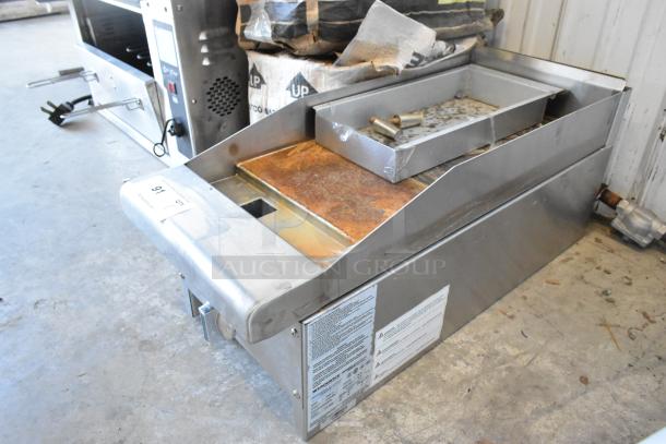 Radiance TAMG-12 stainless steel griddle, natural gas, 22,000 BTU, signs of wear, visible labeling, auction tag #91.
