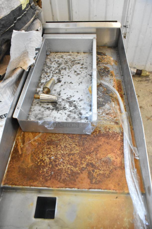 Radiance TAMG-12 stainless steel griddle, 22,000 BTU, natural gas, rusted surface, commercial countertop model, fair condition.