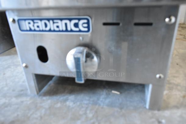 Radiance TAMG-12 stainless steel flat top griddle, natural gas powered, 22,000 BTU. Features control knob and logo.