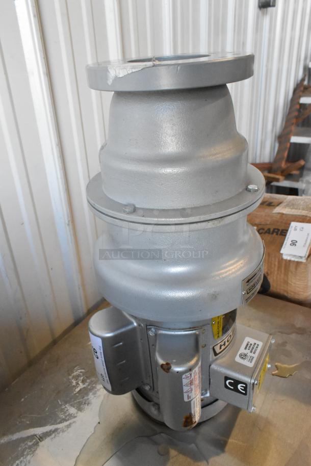 Hobart FD4/75-3 metal commercial garbage disposal, industrial-grade, slightly rusted areas, CE marked.