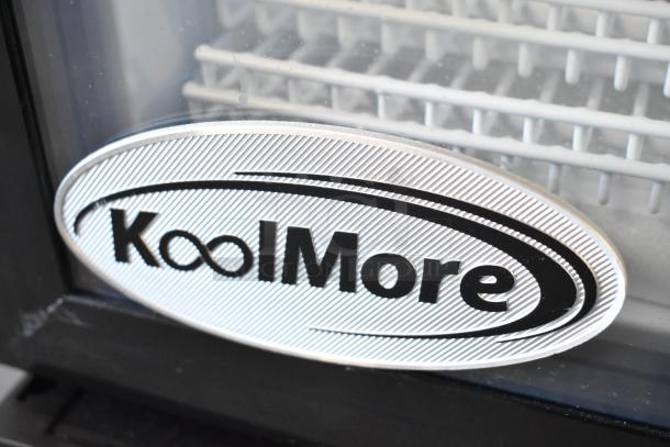 KoolMore KM-MDR-1GD-10C single door cooler, brand new, scratch and dent condition, poly coated racks, commercial casters.