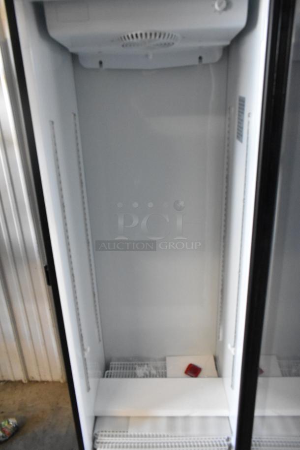 Brand new KoolMore KM-MDR-1GD-10C commercial single door cooler. Features poly coated racks, commercial casters, 115V.