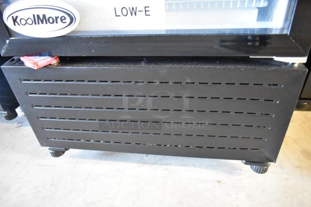 Brand new KoolMore KM-MDR-1GD-10C cooler, metal exterior, commercial casters, minor scratch, poly-coated racks, 115V.