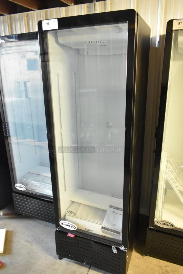 Brand new KoolMore KM-MDR-1GD-10C commercial single door cooler with poly coated racks, on casters. Scratch and dent model.