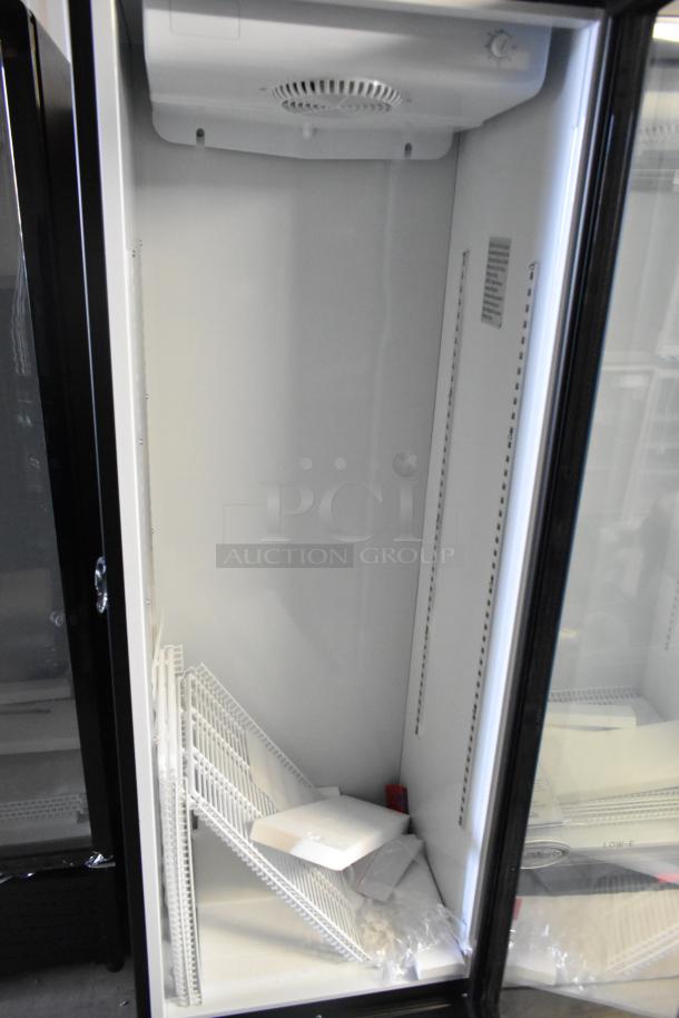 Brand new KoolMore KM-MDR-1GD-10C single door cooler, metal, poly-coated racks, commercial casters, minor scratches.