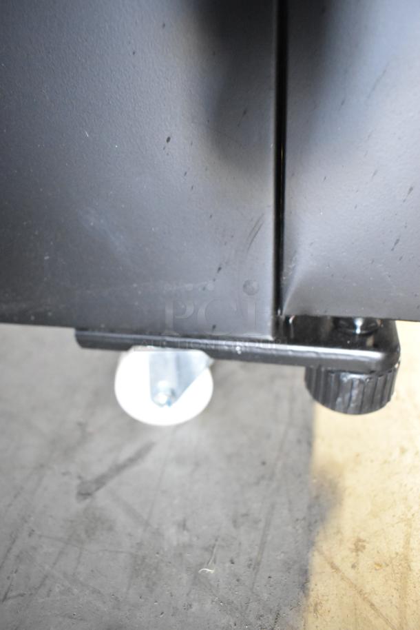 BRAND NEW KoolMore KM-MDR-1GD-10C reach-in cooler, scratch and dent, on commercial casters, 115V, 1 phase.